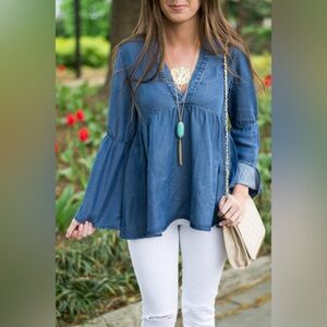 H&M Conscious Size 8 women's denim blouse with a V-neck and long bell sleeves